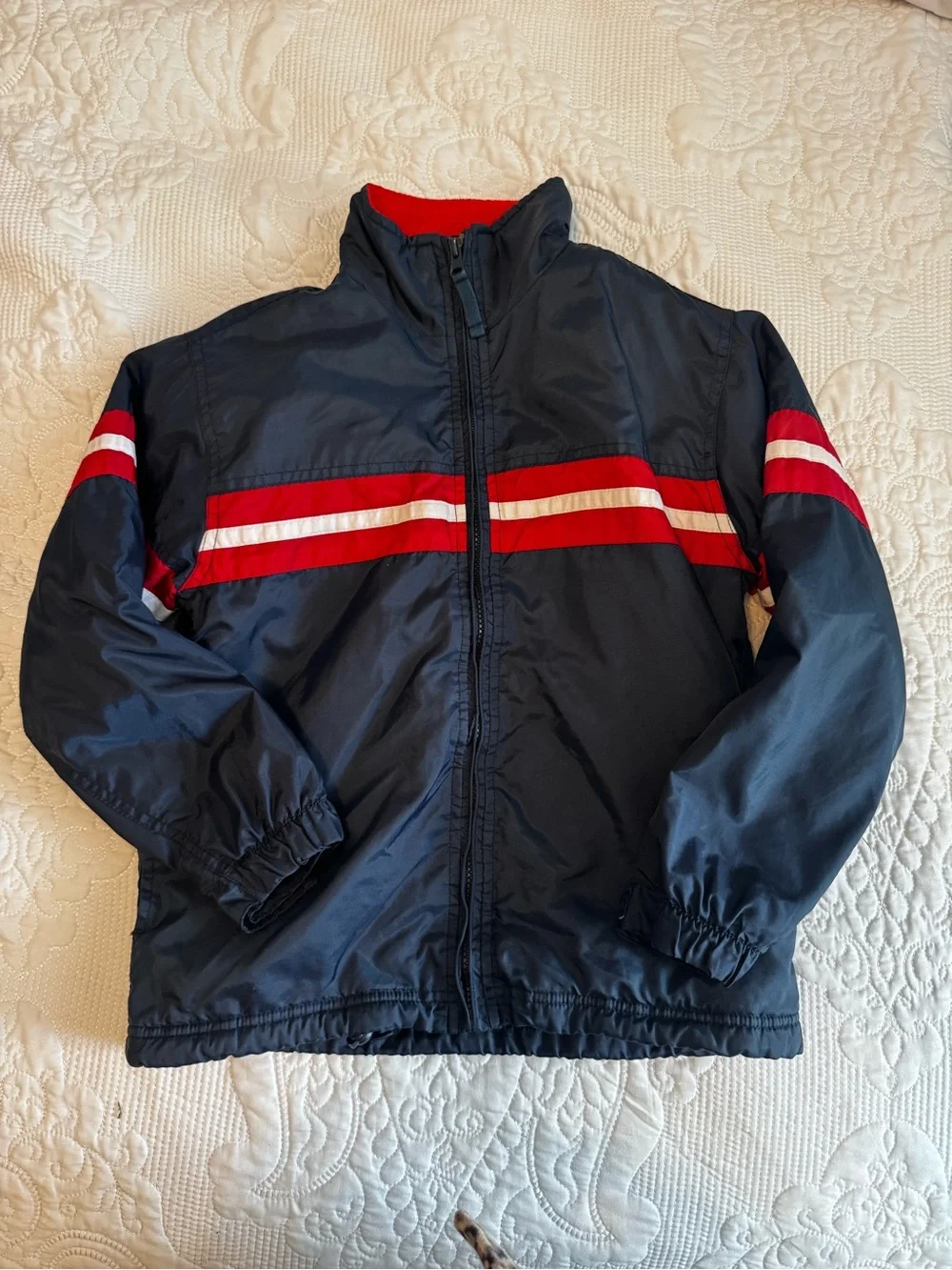 Express Navy Raincoat with Red and White Stripe Detail